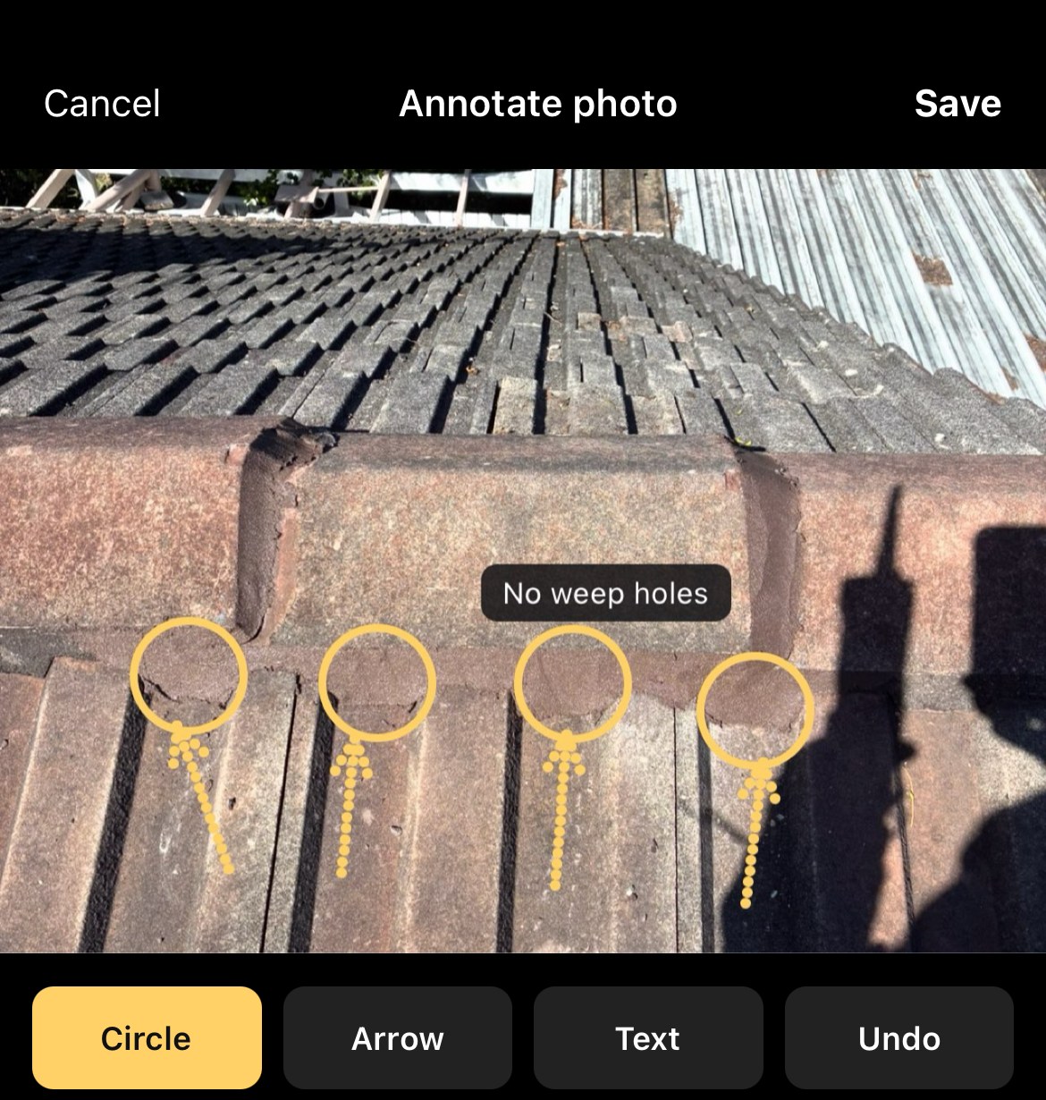 RoofFindings annotation screen showing circles, arrows and a text label marking missing weep holes on a tile roof